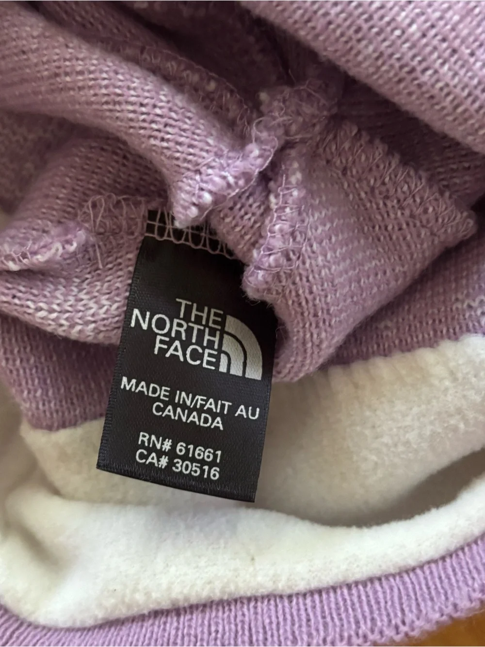 The North Face Purple Snowflake Fleece Lined Tassel Beanie Hat Girls